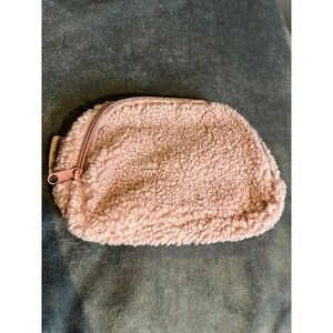 Pink fuzzy belt bag